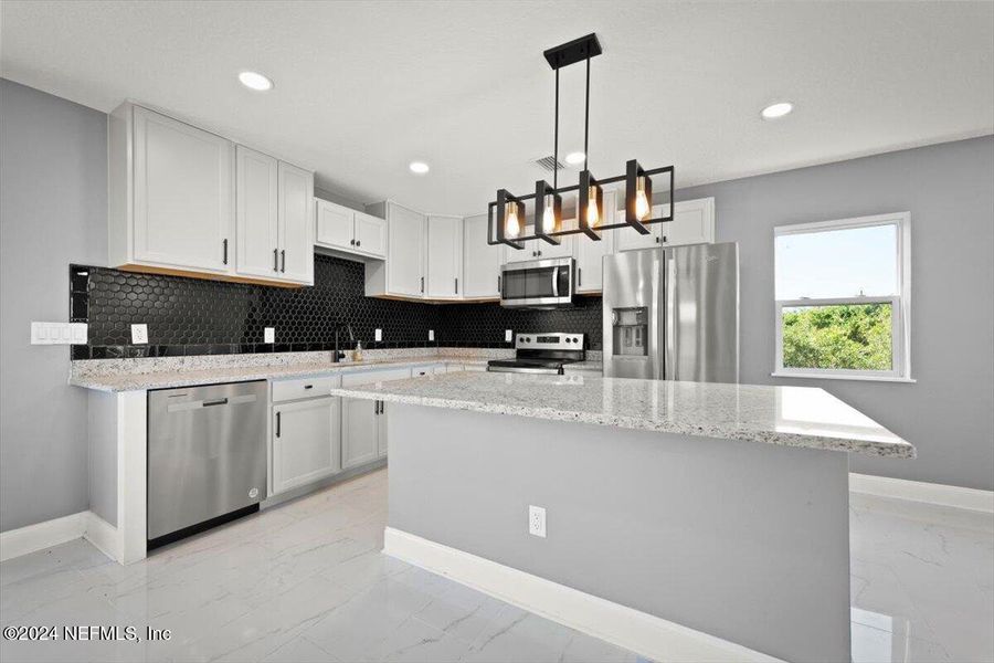 Furnished interior view inside a new home in , St. Augustine (Image 13).