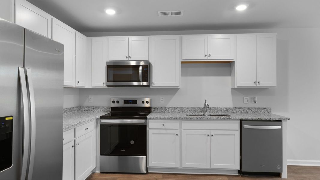 Representative furnished interior of a home built from the SULLIVAN by D.R. Horton in Evergreen, Holly Hill (Image 8).