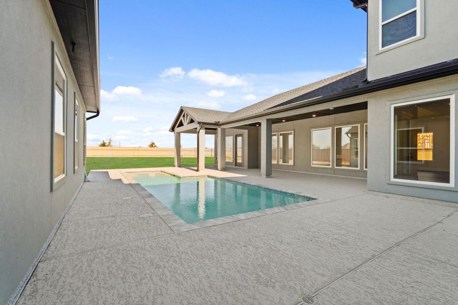 Exterior details and patio area of a home in Bridgeland, Cypress (Image 3). Exterior details and patio area of a home in Bridgeland, Cypress (Image 3).