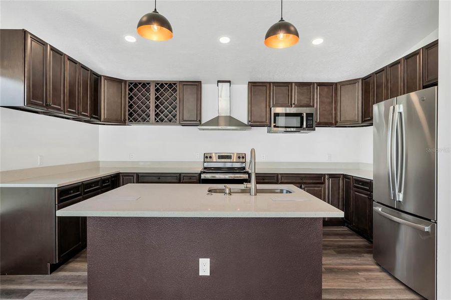 Kitchen w/ Island & Stainless Appliances