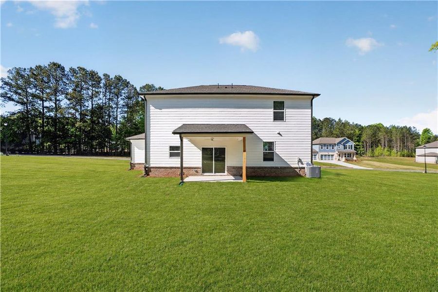 Exterior details and patio area of a home in Shadow Creek, Jackson (Image 4).