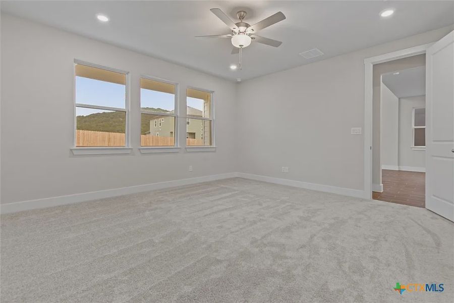 Spacious, unfurnished interior of a new home in Lakeside at Tessera on Lake Travis, Lago Vista (Image 16). Spacious, unfurnished interior of a new home in Lakeside at Tessera on Lake Travis, Lago Vista (Image 16).