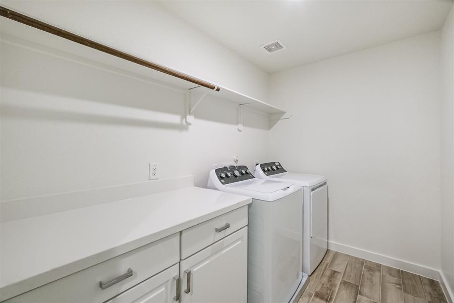 Photos are sample images from a previously built home with the same floor plan. Finishes and fixtures in the current home have been upgraded and may vary.