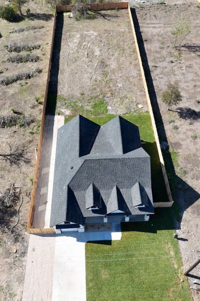 Front exterior of a new home in , Dale, TX, highlighting curb appeal (Image 2).