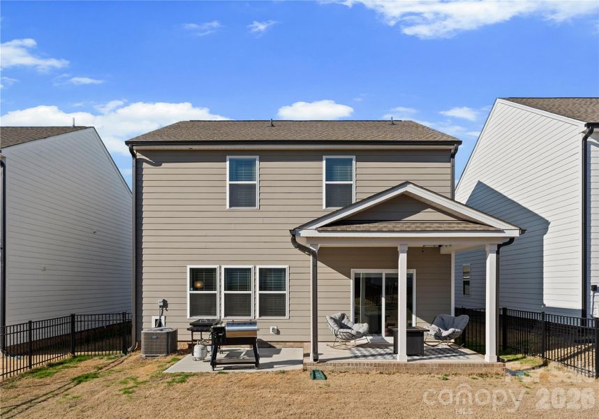 Exterior details and patio area of a home in Scotch Meadows, Monroe (Image 19).