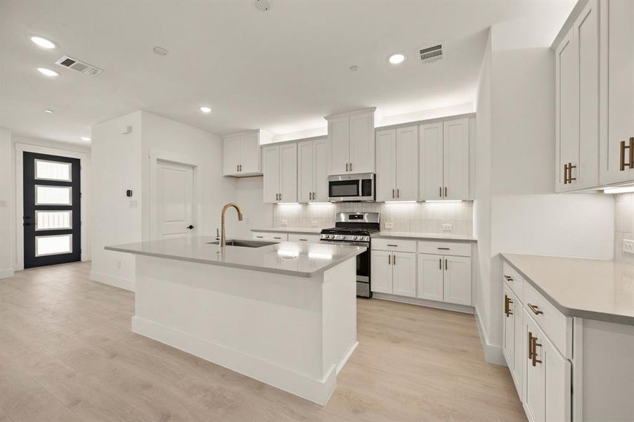 Offering outstanding storage and prep space, any chef would be proud to call this dream kitchen their own! Offering outstanding storage and prep space, any chef would be proud to call this dream kitchen their own!