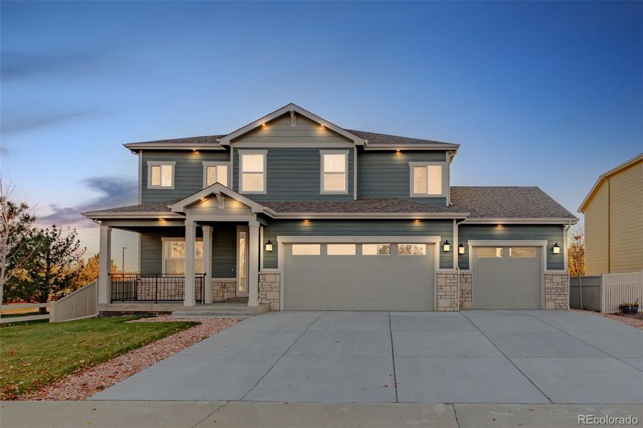 Front exterior of a new home in , Firestone, CO, highlighting curb appeal (Image 30).
