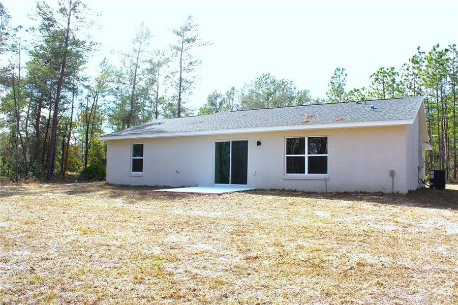 Exterior details and patio area of a home in , Ocklawaha (Image 3).
