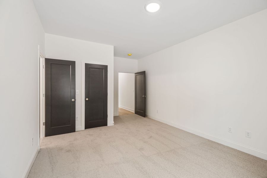 Spacious, unfurnished interior of a new home in Flint Farms, Concord (Image 44).