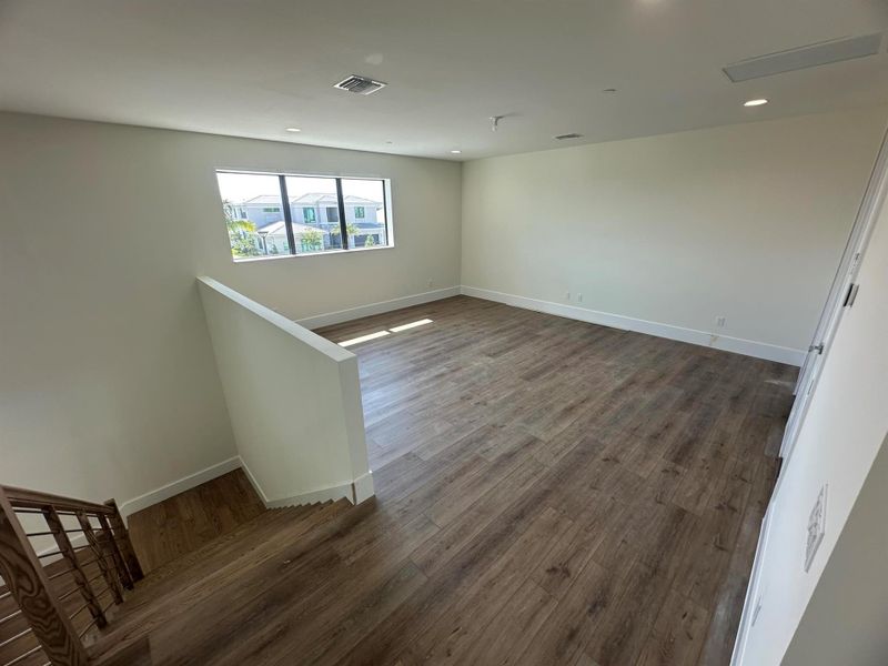 Furnished interior view inside a new home in Coral Isles at Avenir, Palm Beach Gardens (Image 7).