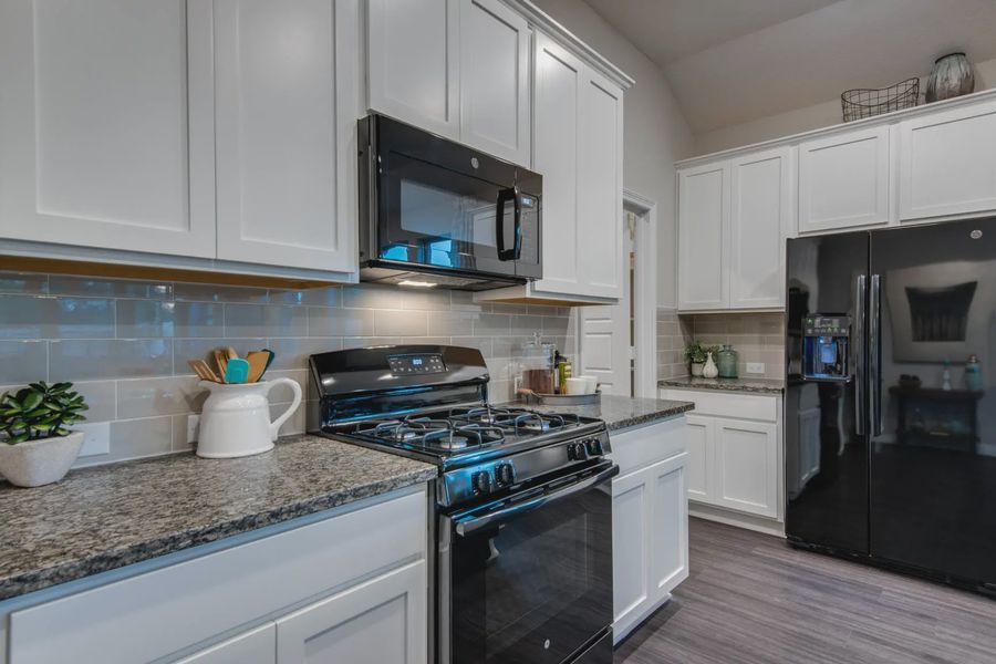Representative furnished interior of a home built from the Asher by Chesmar Homes in Buffalo Crossing, Cibolo (Image 14).