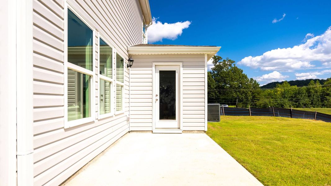 Representative exterior photo of a completed home built from the Darwin by D.R. Horton in Evergreen Landing, Rossville, GA (Image 27).