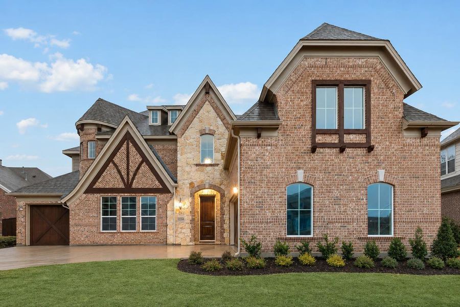 Representative exterior photo of a completed home built from the Downton Abbey - 3 Car Garage by Grand Homes in Heath Golf & Yacht Club, Heath, TX (Image 20). Representative exterior photo of a completed home built from the Downton Abbey - 3 Car Garage by Grand Homes in Heath Golf & Yacht Club, Heath, TX (Image 20).