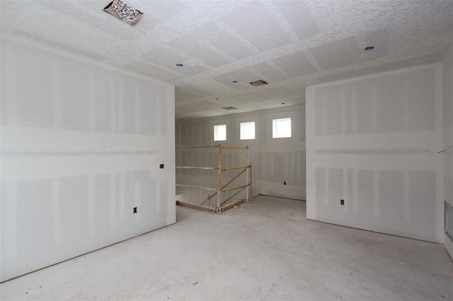 In-progress construction of a new home in Center Lake on the Park, St. Cloud, FL (Image 18).