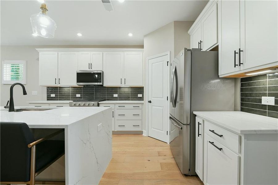 Furnished interior view inside a new home in , Atlanta (Image 9).