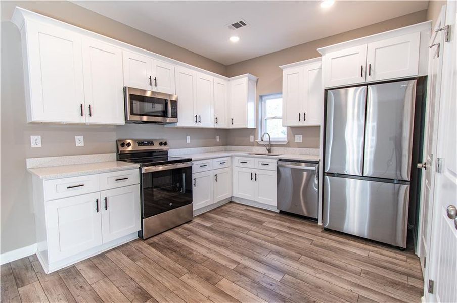 Furnished interior view inside a new home in , Fairmount (Image 5).