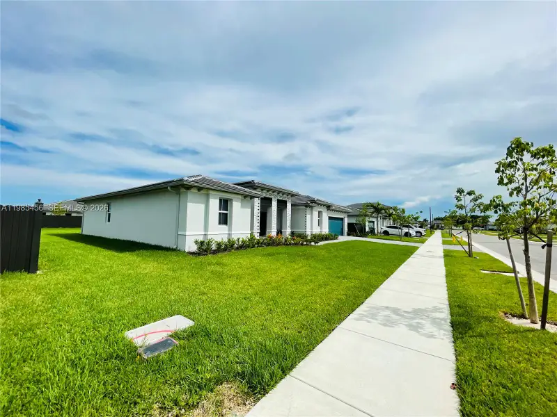 Exterior details and patio area of a home in , Homestead (Image 3).