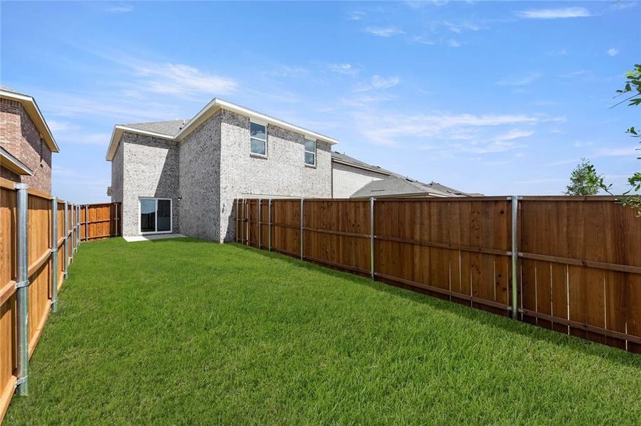 Exterior details and patio area of a home in Brookshire at Legacy Hills, Celina (Image 4). Exterior details and patio area of a home in Brookshire at Legacy Hills, Celina (Image 4).