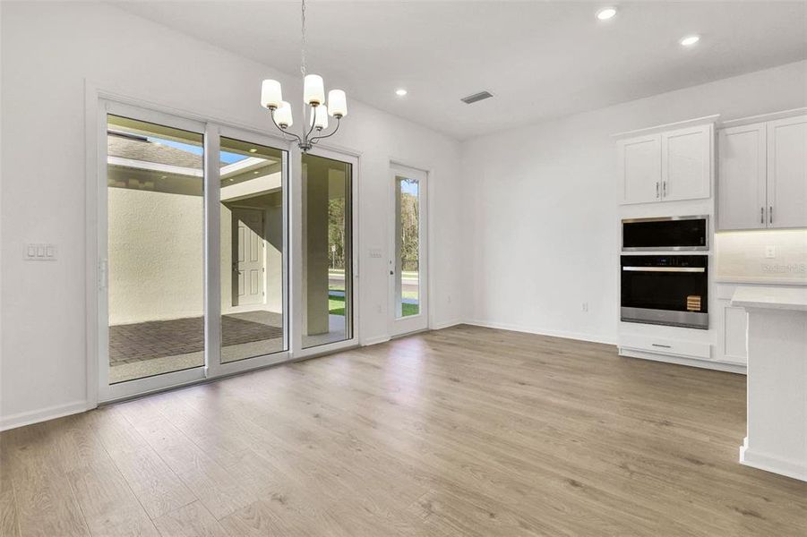 Spacious, unfurnished interior of a new home in Serenade at Ovation, Winter Garden (Image 22).