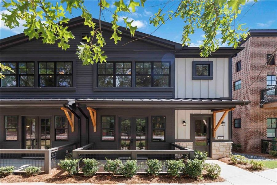 Front exterior of a new home in Serenity, Hapeville, GA, highlighting curb appeal (Image 13). Front exterior of a new home in Serenity, Hapeville, GA, highlighting curb appeal (Image 13).