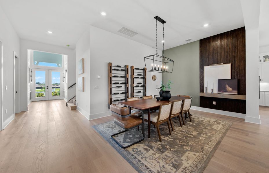 Representative furnished interior of a home built from the Layton Grande by DiVosta in BeachWalk by Manasota Key, Englewood (Image 27).