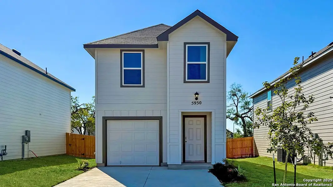 Front exterior of a new home in Blue Ridge Ranch, San Antonio, TX, highlighting curb appeal (Image 2). Front exterior of a new home in Blue Ridge Ranch, San Antonio, TX, highlighting curb appeal (Image 2).