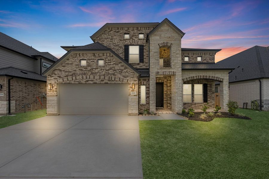 Front exterior of a new home in Morton Creek Ranch, Katy, TX, highlighting curb appeal (Image 21). Front exterior of a new home in Morton Creek Ranch, Katy, TX, highlighting curb appeal (Image 21).