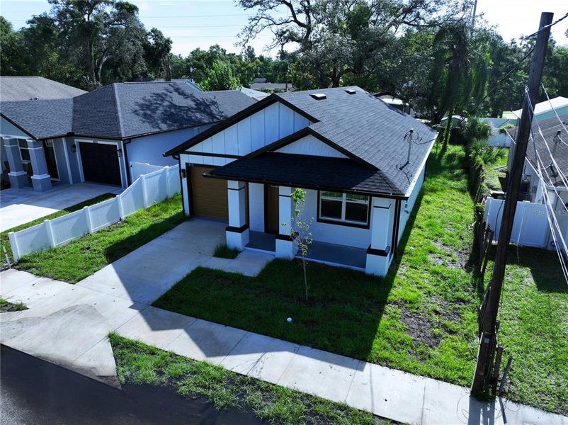 Front exterior of a new home in , Tampa, FL, highlighting curb appeal (Image 21). Front exterior of a new home in , Tampa, FL, highlighting curb appeal (Image 21).