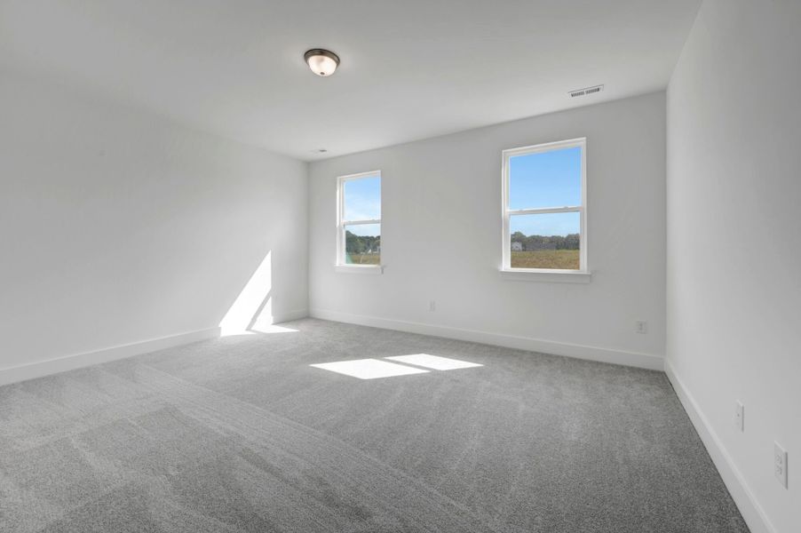 Spacious, unfurnished interior of a new home in McAlister Creek, Clayton (Image 22).