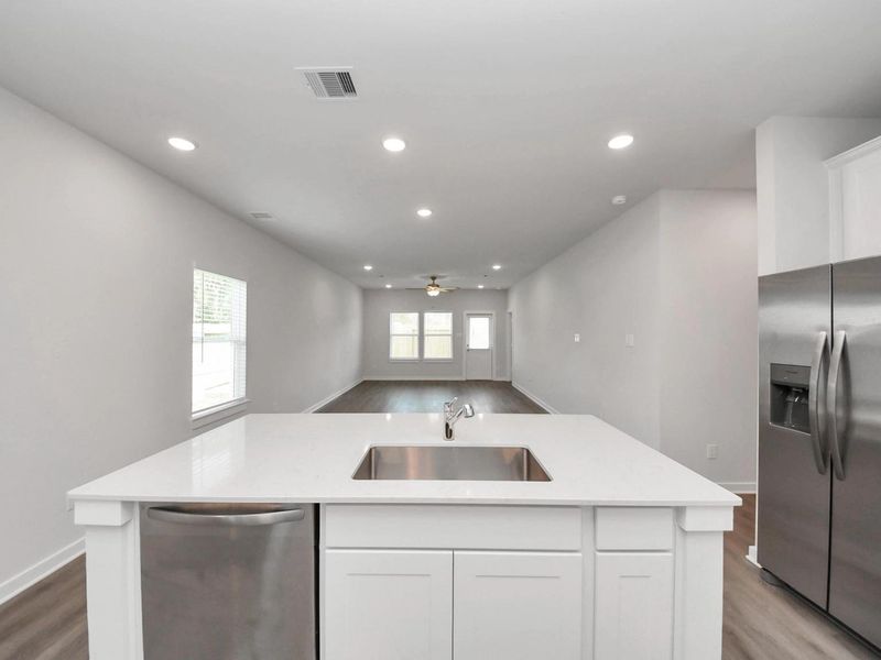 Furnished interior view inside a new home in Caney Creek Place, Conroe (Image 12).