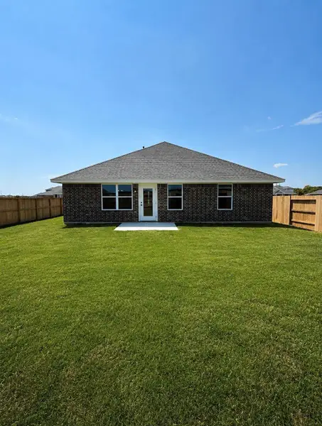 Exterior details and patio area of a home in River Ranch Trails, Dayton (Image 3).
