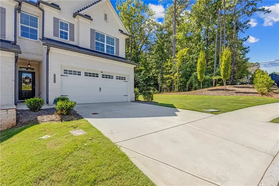 Front exterior of a new home in , Duluth, GA, highlighting curb appeal (Image 30). Front exterior of a new home in , Duluth, GA, highlighting curb appeal (Image 30).