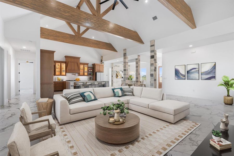 Living area featuring marble finish floors, recessed lighting, high vaulted ceiling, and beamed ceiling. Virtual staging used