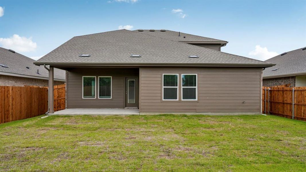 Exterior details and patio area of a home in Frontier Pointe, Princeton (Image 23).