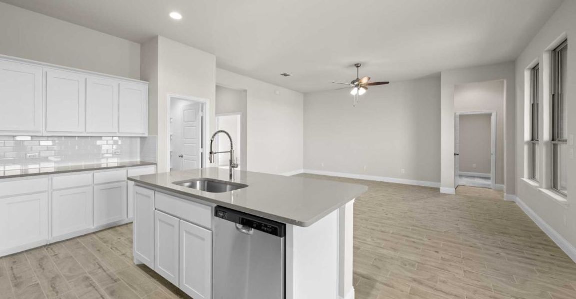 Representative exterior photo of a completed home built from the Alderbury by Impression Homes in Timberbrook, Justin, TX (Image 8).