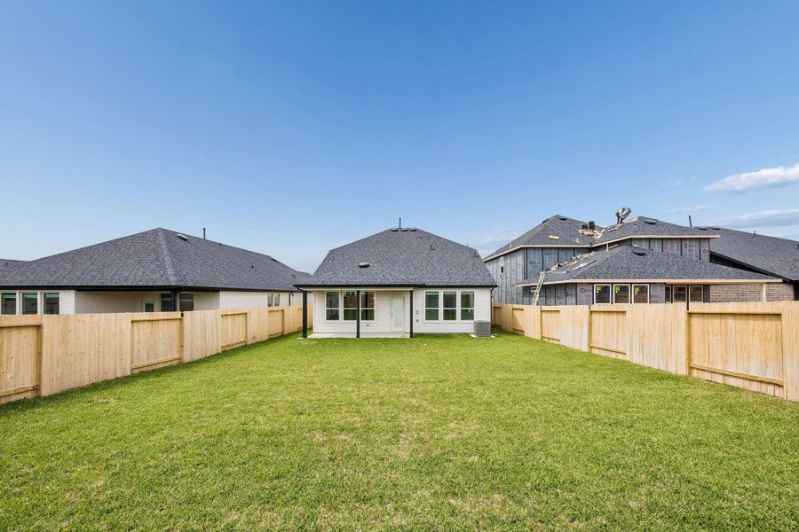 Exterior details and patio area of a home in Montgomery Bend, Montgomery (Image 3).