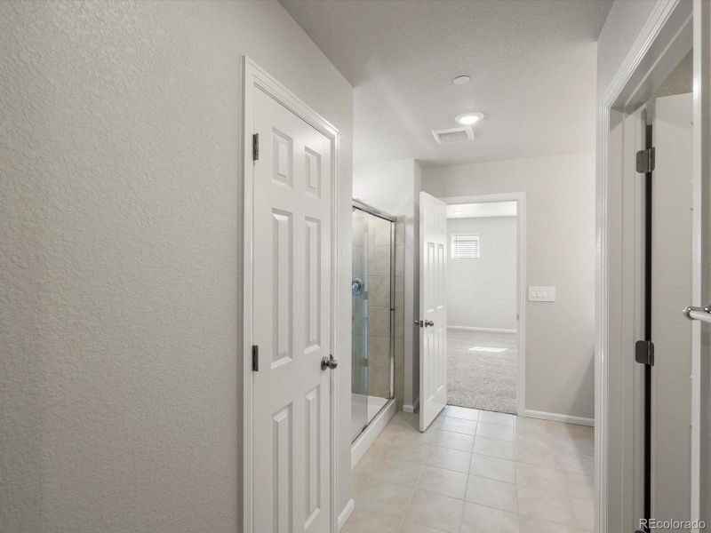 Spacious, unfurnished interior of a new home in Buffalo Highlands: The Flora Collection, Commerce City (Image 26). Spacious, unfurnished interior of a new home in Buffalo Highlands: The Flora Collection, Commerce City (Image 26).