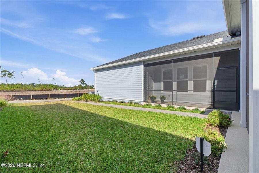 Exterior details and patio area of a home in Seven Pines 50' Rear Entry, Jacksonville (Image 2). Exterior details and patio area of a home in Seven Pines 50' Rear Entry, Jacksonville (Image 2).