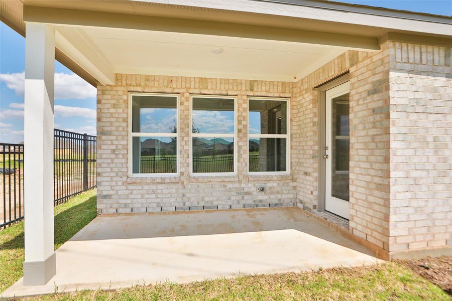 Exterior details and patio area of a home in Sunterra, Katy (Image 15). Exterior details and patio area of a home in Sunterra, Katy (Image 15).