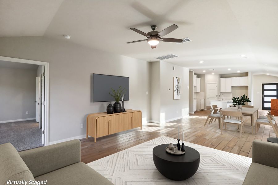 Virtually staged living room in the Cascade floorplan at a Meritage Homes community.