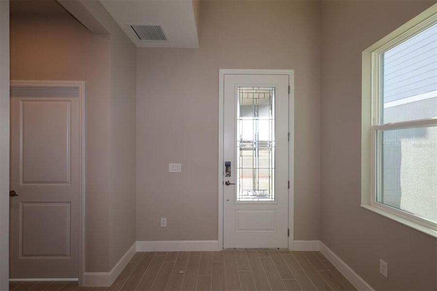 Spacious, unfurnished interior of a new home in Lake Star at Ovation, Winter Garden (Image 21).