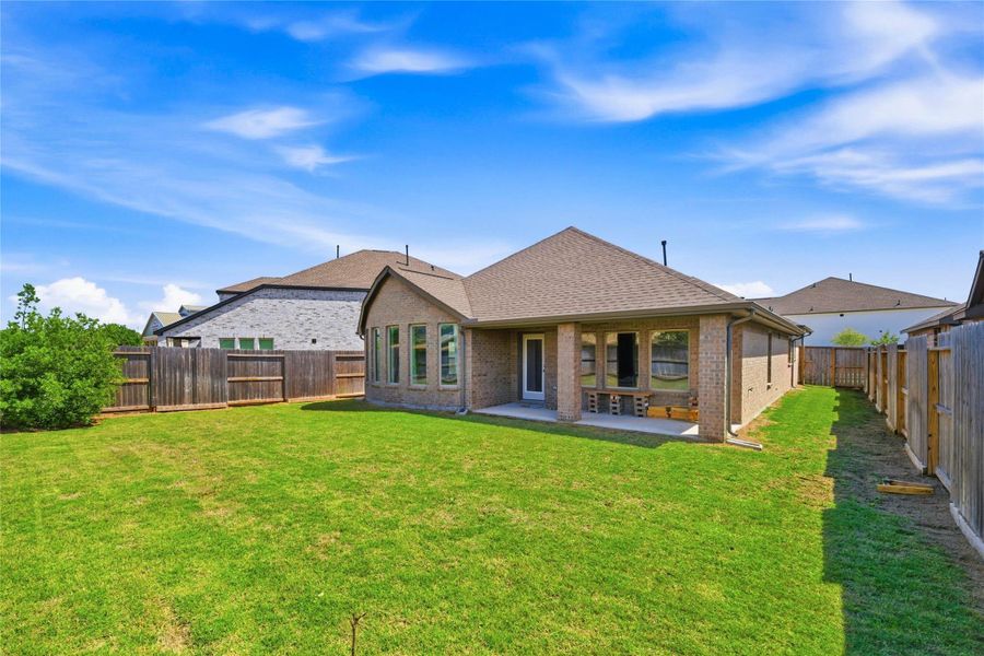 Exterior details and patio area of a home in Candela, Richmond (Image 29).
