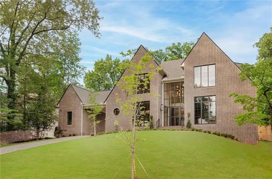 Front exterior of a new home in , Brookhaven, GA, highlighting curb appeal (Image 2). Front exterior of a new home in , Brookhaven, GA, highlighting curb appeal (Image 2).
