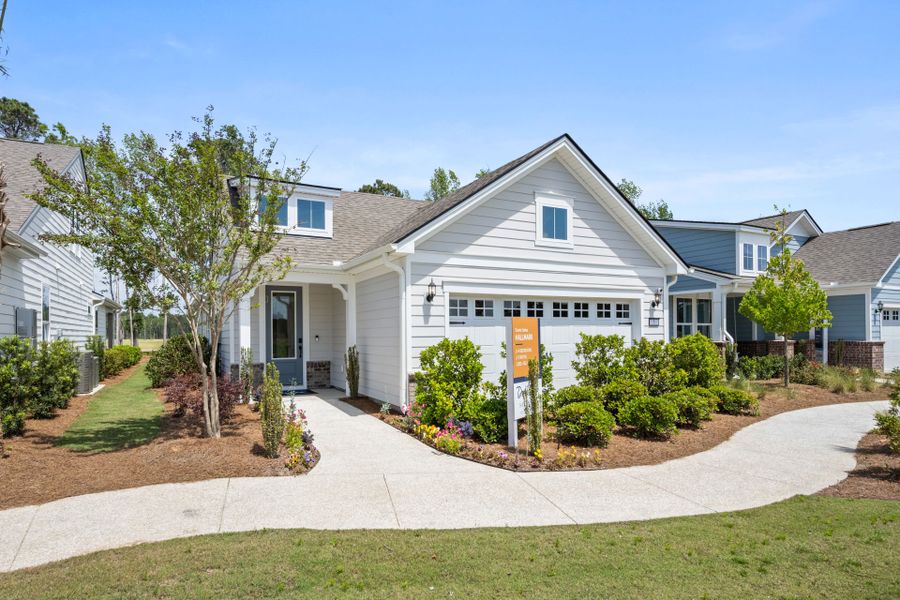 Front exterior of a new home in Del Webb Savannah at Heartwood, Richmond Hill, GA, highlighting curb appeal (Image 27). Front exterior of a new home in Del Webb Savannah at Heartwood, Richmond Hill, GA, highlighting curb appeal (Image 27).