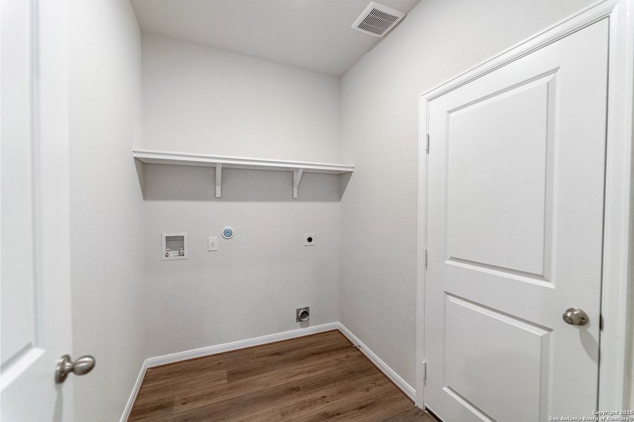 Spacious, unfurnished interior of a new home in The Woodlands at Medina Hills, Mico (Image 18).