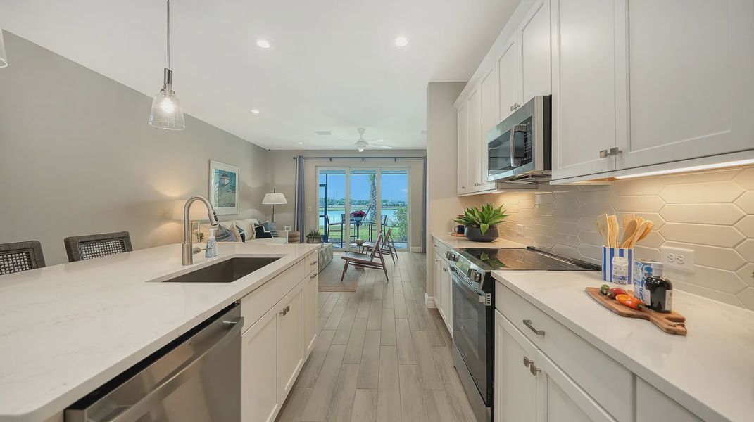 Representative furnished interior of a home built from the Avery by Neal Communities in SkySail, Naples (Image 23).