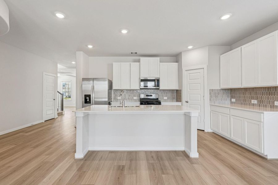 Photo is not of the actual home, but is an inspirational photo of builder’s model home and may depict options, furnishings, and/or decorator features that are not included