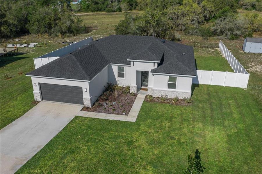 Front exterior of a new home in Ocala, Ocala, FL, highlighting curb appeal (Image 28).