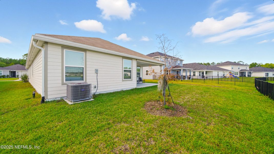 Exterior details and patio area of a home in , Jacksonville (Image 3). Exterior details and patio area of a home in , Jacksonville (Image 3).