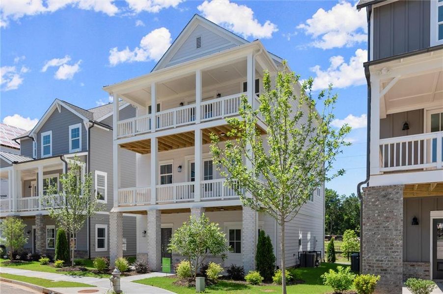 Front exterior of a new home in West Town, Atlanta, GA, highlighting curb appeal (Image 1).